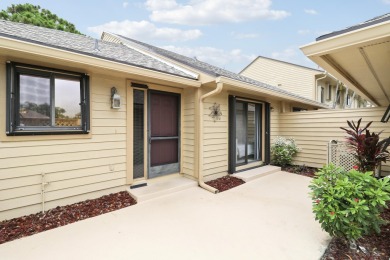 Lovely light and bright 2 bedroom, 2 bath villa with an on Heritage Ridge Golf Club in Florida - for sale on GolfHomes.com, golf home, golf lot