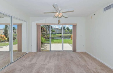 Welcome to beautiful Coral Cove to this spacious ground floor on Westchester Golf and Country Club in Florida - for sale on GolfHomes.com, golf home, golf lot