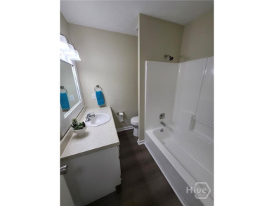 Welcome to this spacious 4-bedroom, 3-bathroom brick split-level on University of Georgia Golf Course in Georgia - for sale on GolfHomes.com, golf home, golf lot