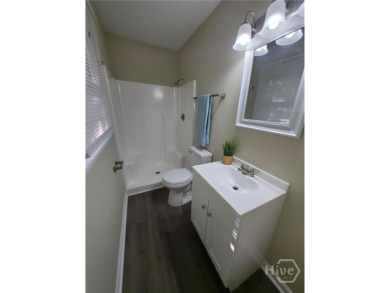 Welcome to this spacious 4-bedroom, 3-bathroom brick split-level on University of Georgia Golf Course in Georgia - for sale on GolfHomes.com, golf home, golf lot
