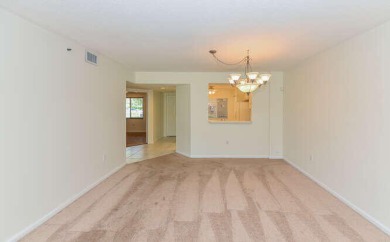 Welcome to beautiful Coral Cove to this spacious ground floor on Westchester Golf and Country Club in Florida - for sale on GolfHomes.com, golf home, golf lot