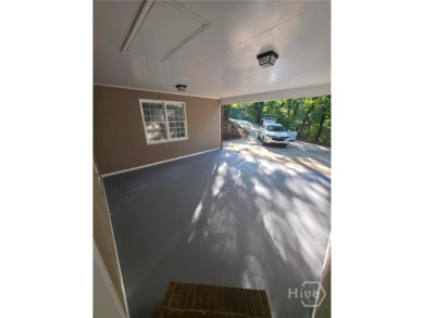 Welcome to this spacious 4-bedroom, 3-bathroom brick split-level on University of Georgia Golf Course in Georgia - for sale on GolfHomes.com, golf home, golf lot