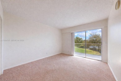 Great 2 bedrooms and 1.5 baths Condo with lake and golf view in on Flamingo Lakes Country Club in Florida - for sale on GolfHomes.com, golf home, golf lot