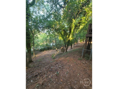 Welcome to this spacious 4-bedroom, 3-bathroom brick split-level on University of Georgia Golf Course in Georgia - for sale on GolfHomes.com, golf home, golf lot