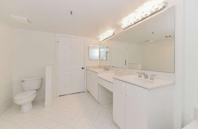 Welcome to beautiful Coral Cove to this spacious ground floor on Westchester Golf and Country Club in Florida - for sale on GolfHomes.com, golf home, golf lot