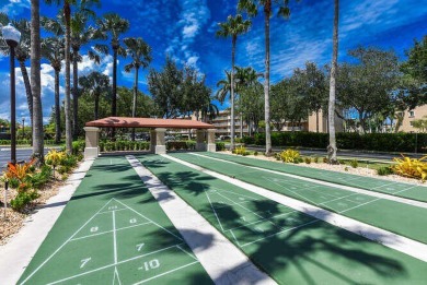 Welcome to beautiful Coral Cove to this spacious ground floor on Westchester Golf and Country Club in Florida - for sale on GolfHomes.com, golf home, golf lot