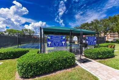 Welcome to beautiful Coral Cove to this spacious ground floor on Westchester Golf and Country Club in Florida - for sale on GolfHomes.com, golf home, golf lot