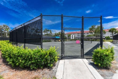 Welcome to beautiful Coral Cove to this spacious ground floor on Westchester Golf and Country Club in Florida - for sale on GolfHomes.com, golf home, golf lot