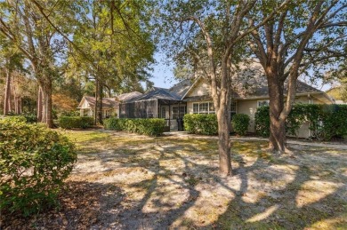 This property offers a spacious 3-bedroom, 2-bath layout with a on Laurel Island Links in Georgia - for sale on GolfHomes.com, golf home, golf lot