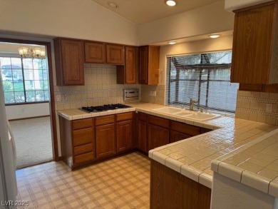 BEAUTIFUL SINGLE STORY VILLA STYLE HOME WITH GOLF FRONTAGE on Painted Desert Golf Club in Nevada - for sale on GolfHomes.com, golf home, golf lot