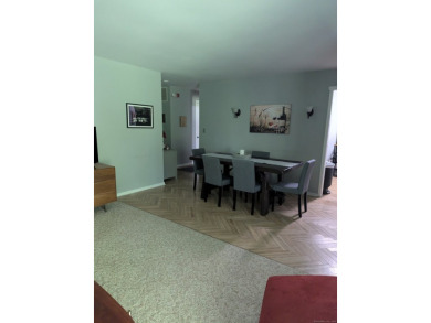 This bright, private unit has beautiful views! Natural light on Gainfield Farms Golf Course in Connecticut - for sale on GolfHomes.com, golf home, golf lot