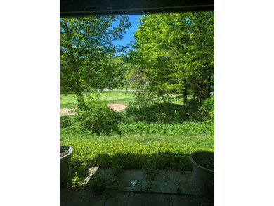 This bright, private unit has beautiful views! Natural light on Gainfield Farms Golf Course in Connecticut - for sale on GolfHomes.com, golf home, golf lot