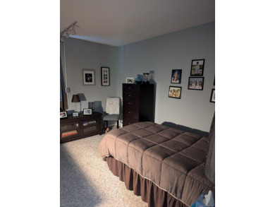 This bright, private unit has beautiful views! Natural light on Gainfield Farms Golf Course in Connecticut - for sale on GolfHomes.com, golf home, golf lot