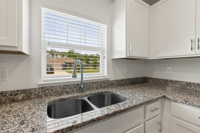 This almost new home (a year and half young) in beautiful on The Grand Club Cypress Course in Florida - for sale on GolfHomes.com, golf home, golf lot