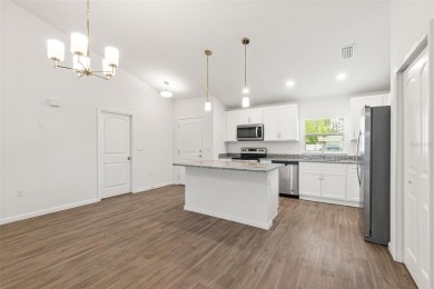 This almost new home (a year and half young) in beautiful on The Grand Club Cypress Course in Florida - for sale on GolfHomes.com, golf home, golf lot
