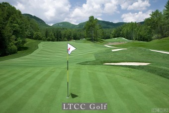 Sweeping mountain views are available from this ten-acre parcel on Lake Toxaway Country Club in North Carolina - for sale on GolfHomes.com, golf home, golf lot
