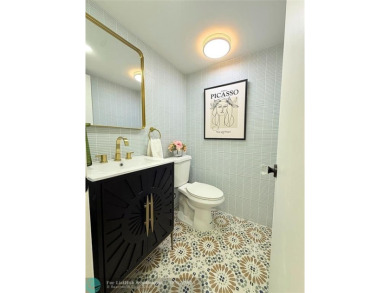 NEW BATHS, TILE  WATERPROOF FLOORING, UPDATED KITCHEN, NEW WATER on Sunrise Lakes Phase III in Florida - for sale on GolfHomes.com, golf home, golf lot
