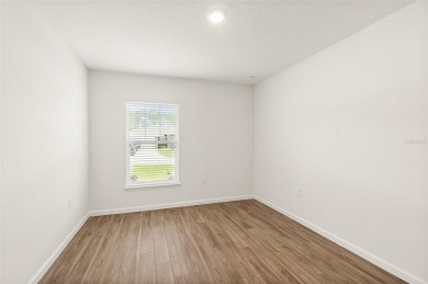 This almost new home (a year and half young) in beautiful on The Grand Club Cypress Course in Florida - for sale on GolfHomes.com, golf home, golf lot