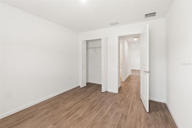 This almost new home (a year and half young) in beautiful on The Grand Club Cypress Course in Florida - for sale on GolfHomes.com, golf home, golf lot