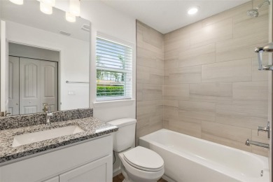 This almost new home (a year and half young) in beautiful on The Grand Club Cypress Course in Florida - for sale on GolfHomes.com, golf home, golf lot