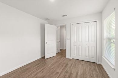 This almost new home (a year and half young) in beautiful on The Grand Club Cypress Course in Florida - for sale on GolfHomes.com, golf home, golf lot