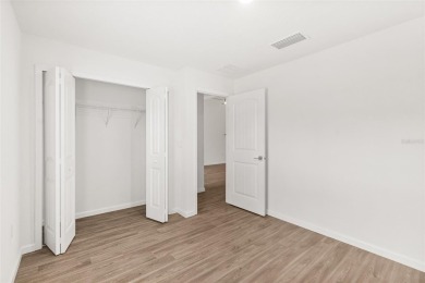 This almost new home (a year and half young) in beautiful on The Grand Club Cypress Course in Florida - for sale on GolfHomes.com, golf home, golf lot