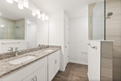 This almost new home (a year and half young) in beautiful on The Grand Club Cypress Course in Florida - for sale on GolfHomes.com, golf home, golf lot