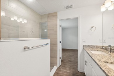 This almost new home (a year and half young) in beautiful on The Grand Club Cypress Course in Florida - for sale on GolfHomes.com, golf home, golf lot