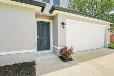 This almost new home (a year and half young) in beautiful on The Grand Club Cypress Course in Florida - for sale on GolfHomes.com, golf home, golf lot