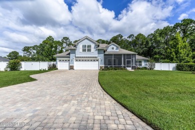 Welcome to your dream home nestled on a quiet cul-de-sac in a on Amelia National Golf and Country Club in Florida - for sale on GolfHomes.com, golf home, golf lot