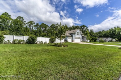 Welcome to your dream home nestled on a quiet cul-de-sac in a on Amelia National Golf and Country Club in Florida - for sale on GolfHomes.com, golf home, golf lot