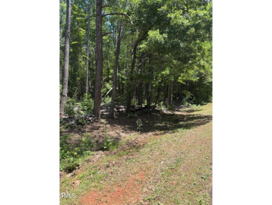 NICE BUILDABLE LOT  Looking to build your new home? Come take a on River Golf and County Club at Lake Royale in North Carolina - for sale on GolfHomes.com, golf home, golf lot