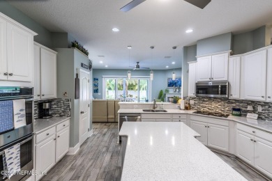 Welcome to your dream home nestled on a quiet cul-de-sac in a on Amelia National Golf and Country Club in Florida - for sale on GolfHomes.com, golf home, golf lot