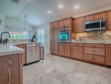 Welcome to this LOVELY LILAC DESIGNER HOME with a GOLF CART on Bella Glade Country Club in Florida - for sale on GolfHomes.com, golf home, golf lot