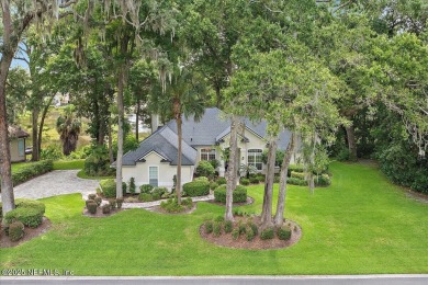 LOCATION, LOCATION - LOVELY MARSH VIEW HOME LOCATED IN THE on Queens Harbour Yacht and Country Club in Florida - for sale on GolfHomes.com, golf home, golf lot