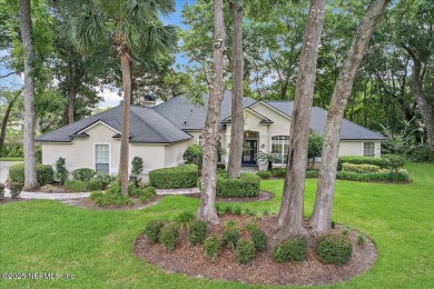 LOCATION, LOCATION - LOVELY MARSH VIEW HOME LOCATED IN THE on Queens Harbour Yacht and Country Club in Florida - for sale on GolfHomes.com, golf home, golf lot