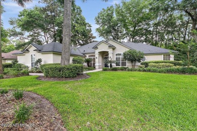 LOCATION, LOCATION - LOVELY MARSH VIEW HOME LOCATED IN THE on Queens Harbour Yacht and Country Club in Florida - for sale on GolfHomes.com, golf home, golf lot