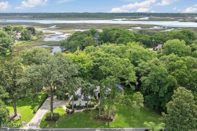LOCATION, LOCATION - LOVELY MARSH VIEW HOME LOCATED IN THE on Queens Harbour Yacht and Country Club in Florida - for sale on GolfHomes.com, golf home, golf lot