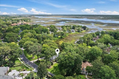 LOCATION, LOCATION - LOVELY MARSH VIEW HOME LOCATED IN THE on Queens Harbour Yacht and Country Club in Florida - for sale on GolfHomes.com, golf home, golf lot
