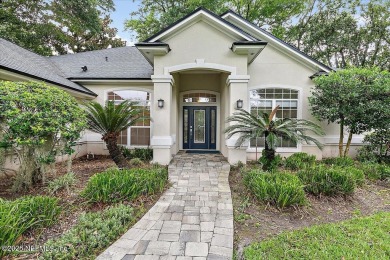 LOCATION, LOCATION - LOVELY MARSH VIEW HOME LOCATED IN THE on Queens Harbour Yacht and Country Club in Florida - for sale on GolfHomes.com, golf home, golf lot