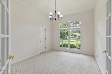 LOCATION, LOCATION - LOVELY MARSH VIEW HOME LOCATED IN THE on Queens Harbour Yacht and Country Club in Florida - for sale on GolfHomes.com, golf home, golf lot