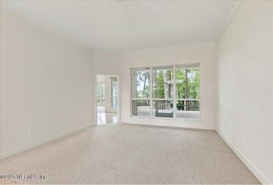 LOCATION, LOCATION - LOVELY MARSH VIEW HOME LOCATED IN THE on Queens Harbour Yacht and Country Club in Florida - for sale on GolfHomes.com, golf home, golf lot