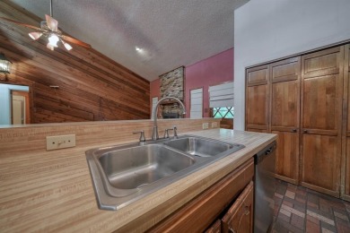 Step inside this charming single-story cottage and discover the on Hide-A-Way Lake Golf Course in Texas - for sale on GolfHomes.com, golf home, golf lot