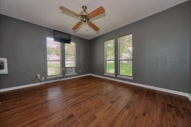 Step inside this charming single-story cottage and discover the on Hide-A-Way Lake Golf Course in Texas - for sale on GolfHomes.com, golf home, golf lot