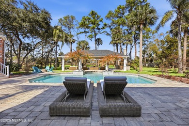 A rare gated estate set on nearly five private acres in Queens on Queens Harbour Yacht and Country Club in Florida - for sale on GolfHomes.com, golf home, golf lot