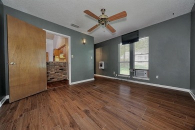 Step inside this charming single-story cottage and discover the on Hide-A-Way Lake Golf Course in Texas - for sale on GolfHomes.com, golf home, golf lot