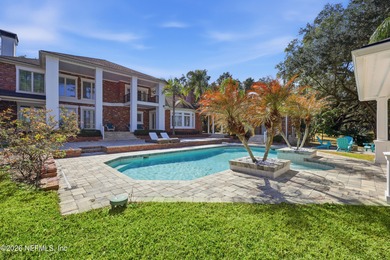 A rare gated estate set on nearly five private acres in Queens on Queens Harbour Yacht and Country Club in Florida - for sale on GolfHomes.com, golf home, golf lot