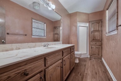 Step inside this charming single-story cottage and discover the on Hide-A-Way Lake Golf Course in Texas - for sale on GolfHomes.com, golf home, golf lot