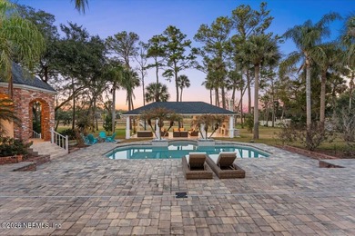 A rare gated estate set on nearly five private acres in Queens on Queens Harbour Yacht and Country Club in Florida - for sale on GolfHomes.com, golf home, golf lot