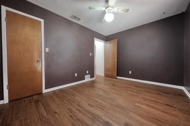 Step inside this charming single-story cottage and discover the on Hide-A-Way Lake Golf Course in Texas - for sale on GolfHomes.com, golf home, golf lot